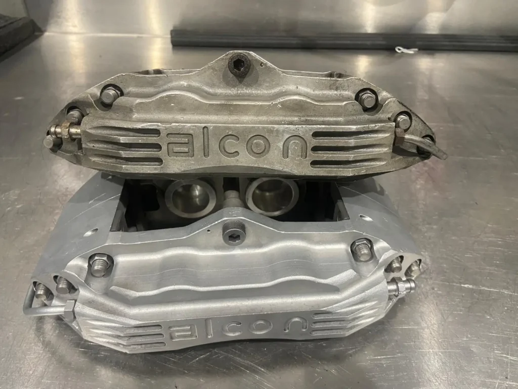 Alcon brake calipers before and after vapour blasting at Welshpool Auto Service Perth